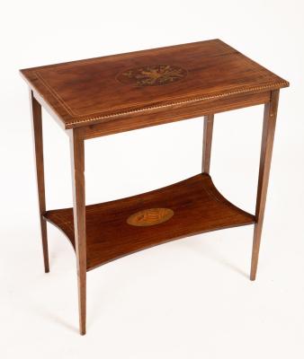 An Edwardian mahogany inlaid table