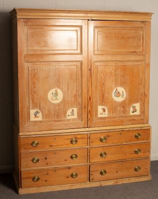 A housemaids pine cupboard with drawers