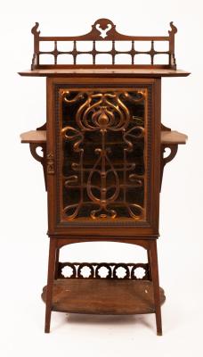 An Art Nouveau music cabinet, the glazed