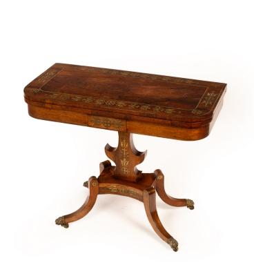 A Regency rosewood and brass inlaid