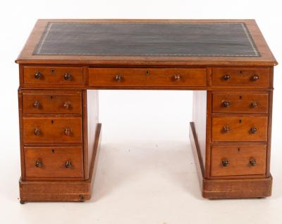 A Victorian pedestal desk fitted nine