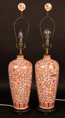 A pair of Oriental style vases decorated