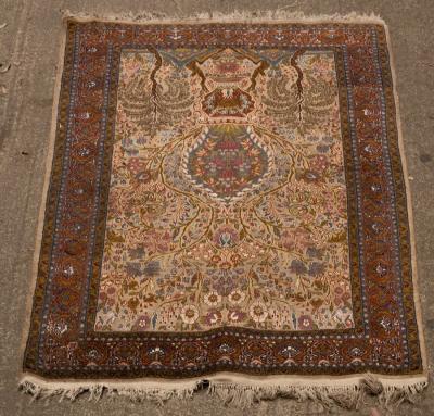 An Indian rug with vase of flowers design,