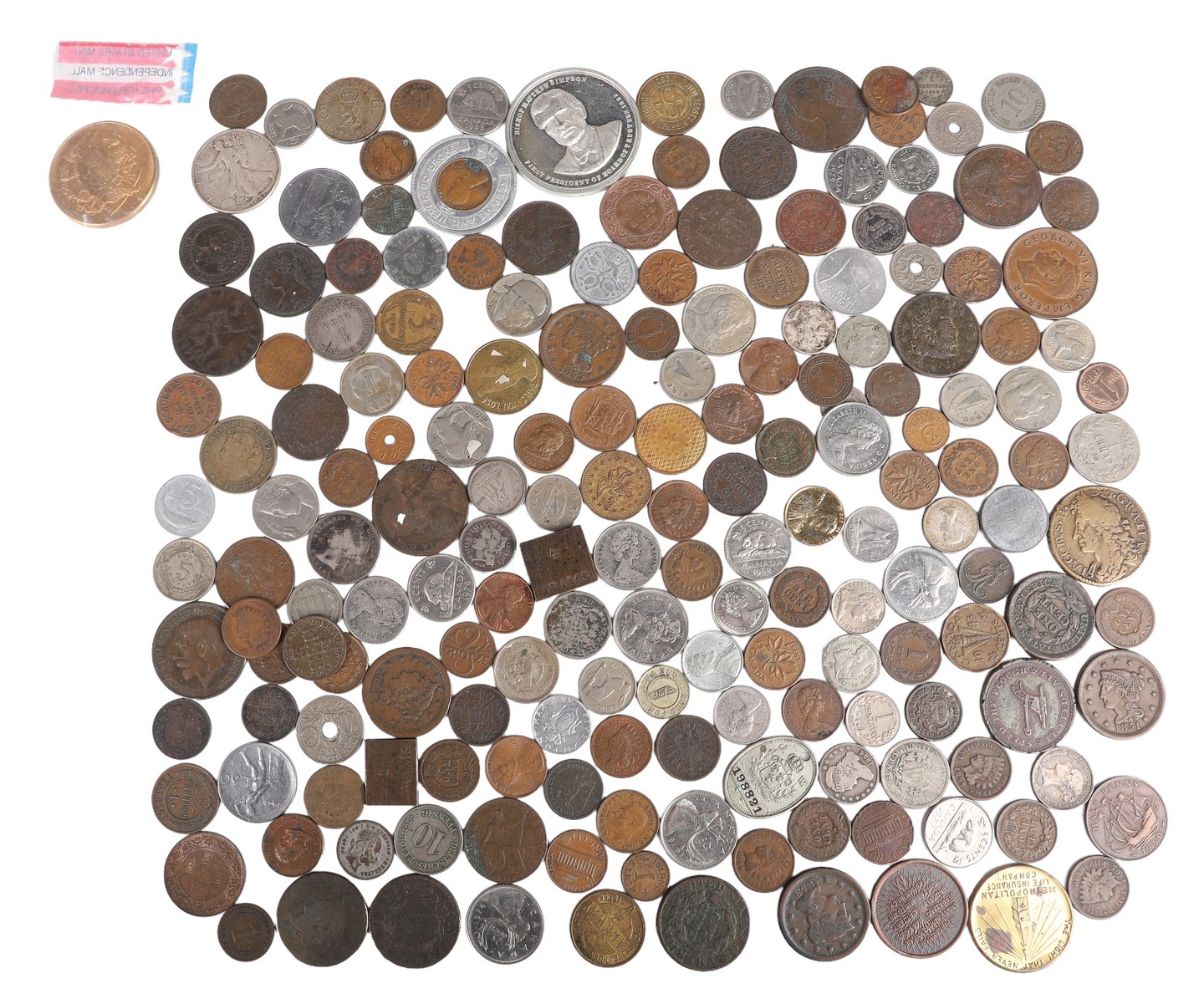 Lot of foreign coins & tokens