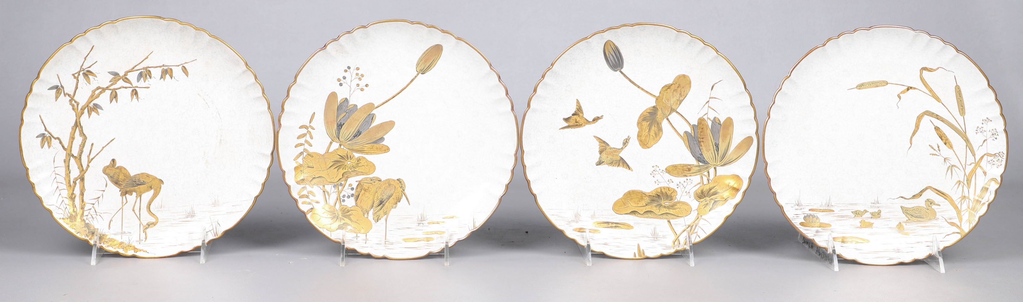 (4) Hand gilded porcelain plates, stamped