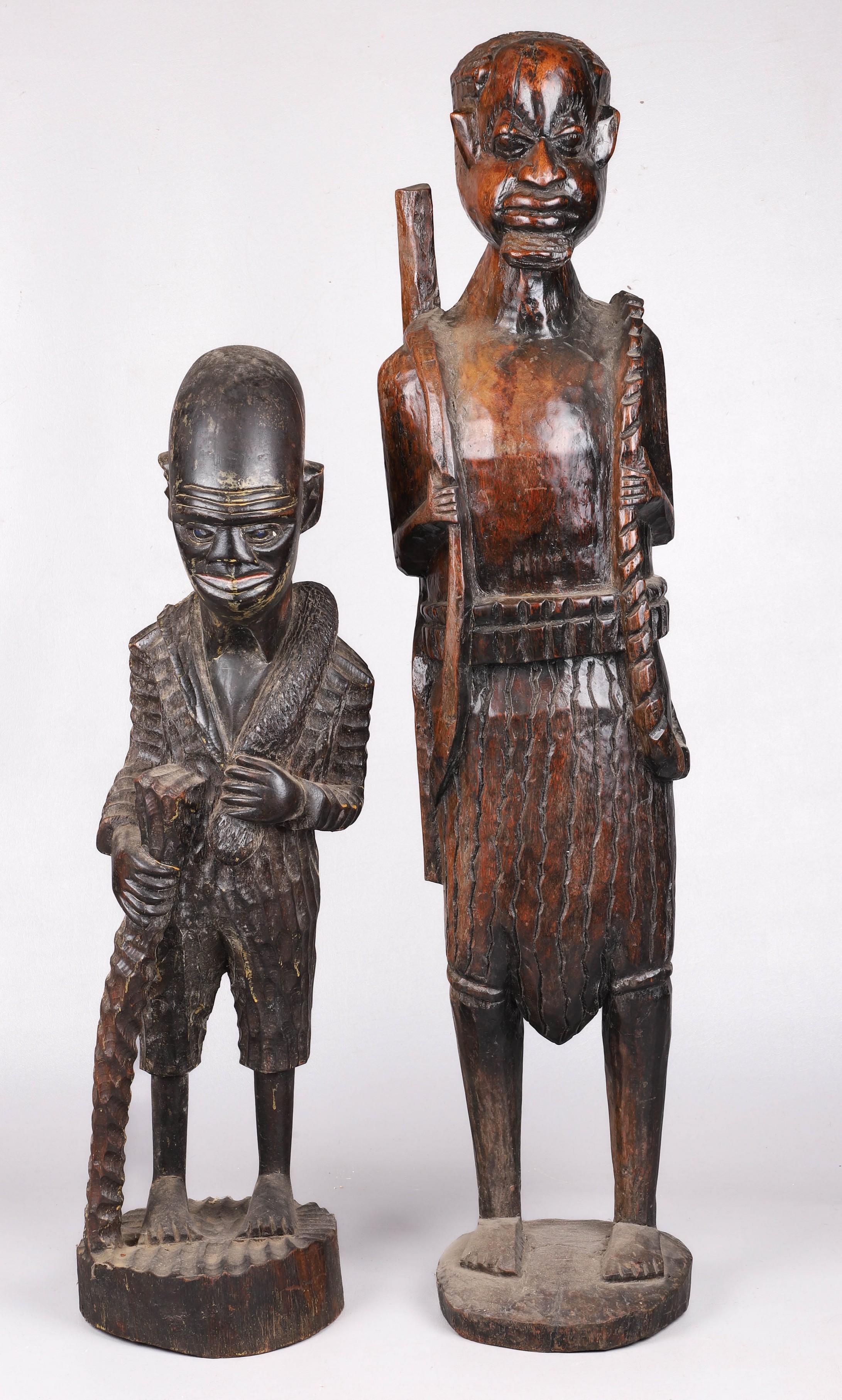 (2) Primitive carved African wood