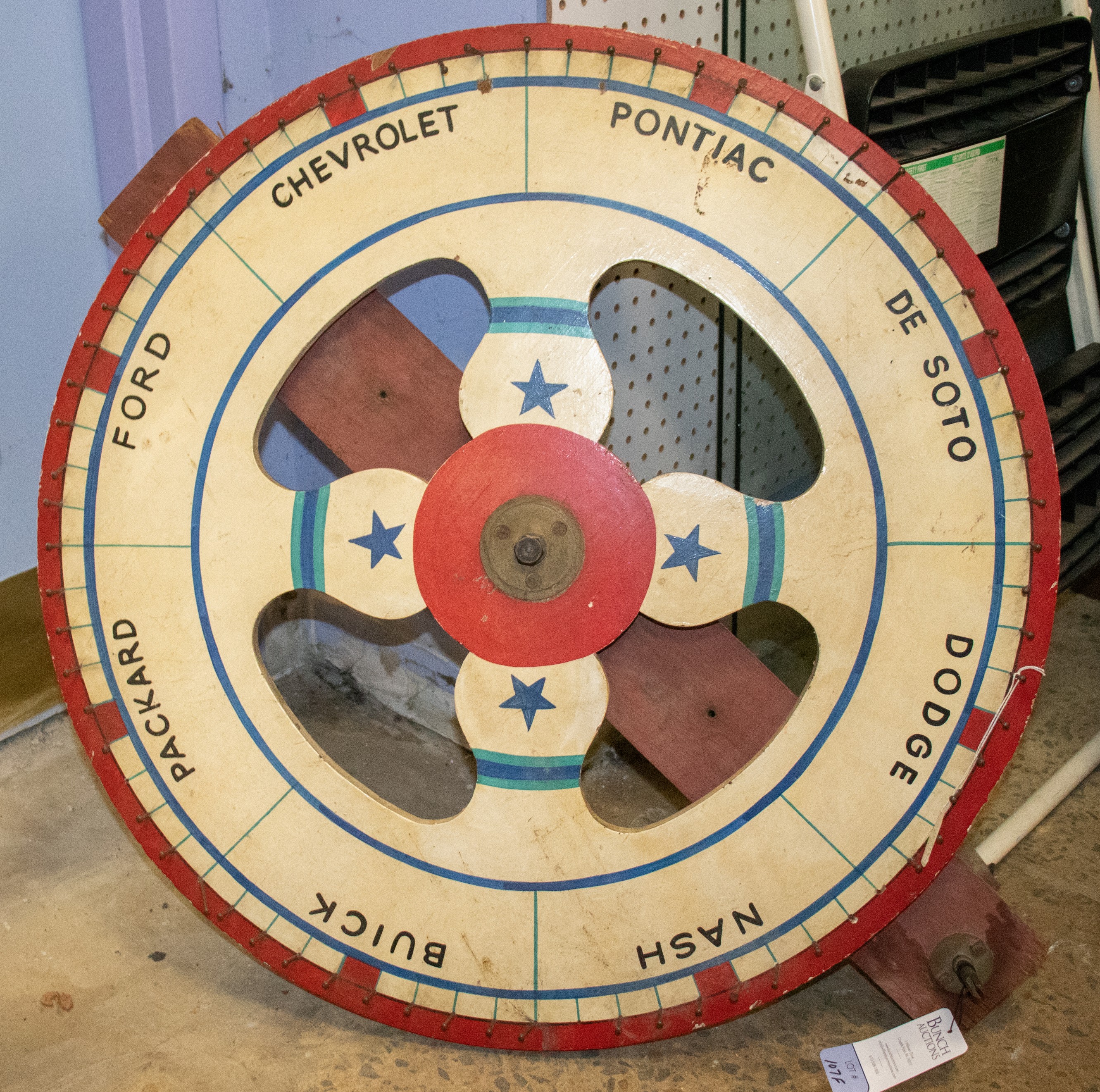 Painted spinning wood game wheel  27a7aa