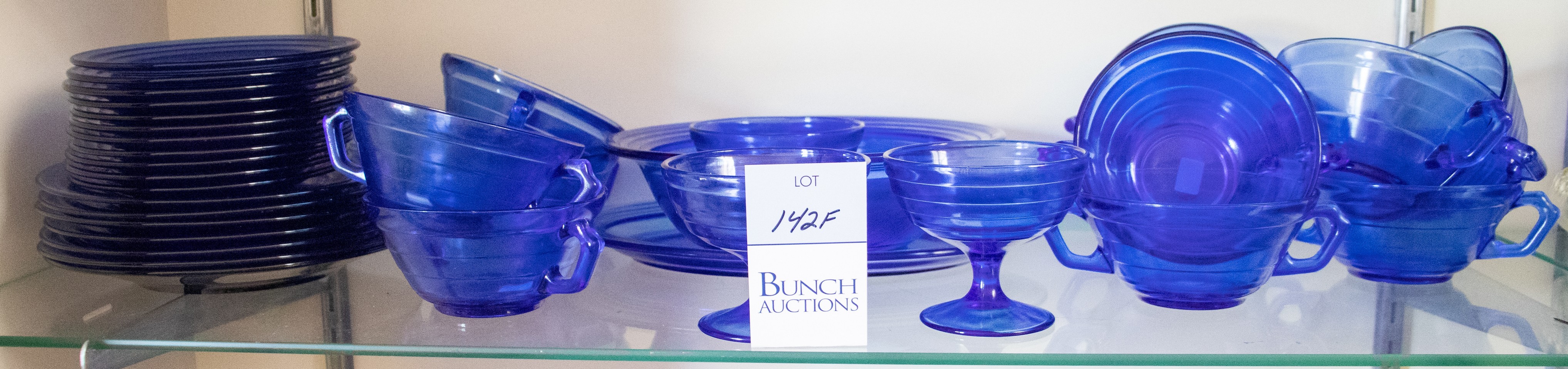 (34) Pcs blue glass dinnerware, c/o