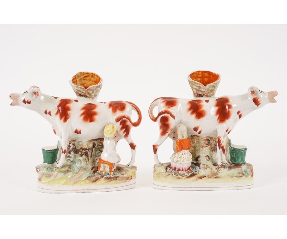 Pair of Staffordshire cow spill 278ebc