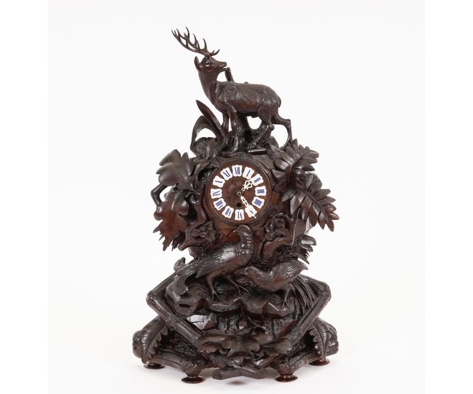 Black Forest carved clock, late 19th