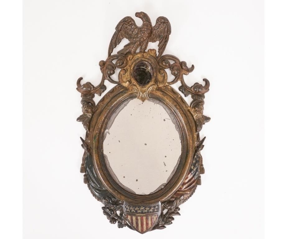 Cast iron framed oval mirror, with