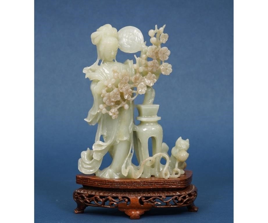 Chinese carved jade figure with plant