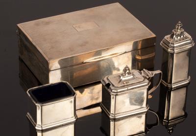 A rectangular silver cigarette box,