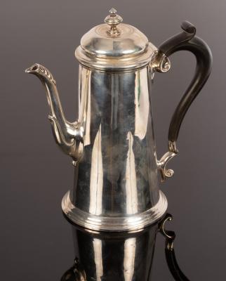 A Georgian style silver coffee pot,