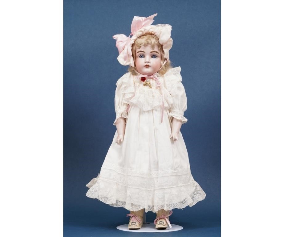 Bisque head doll with kid leather body