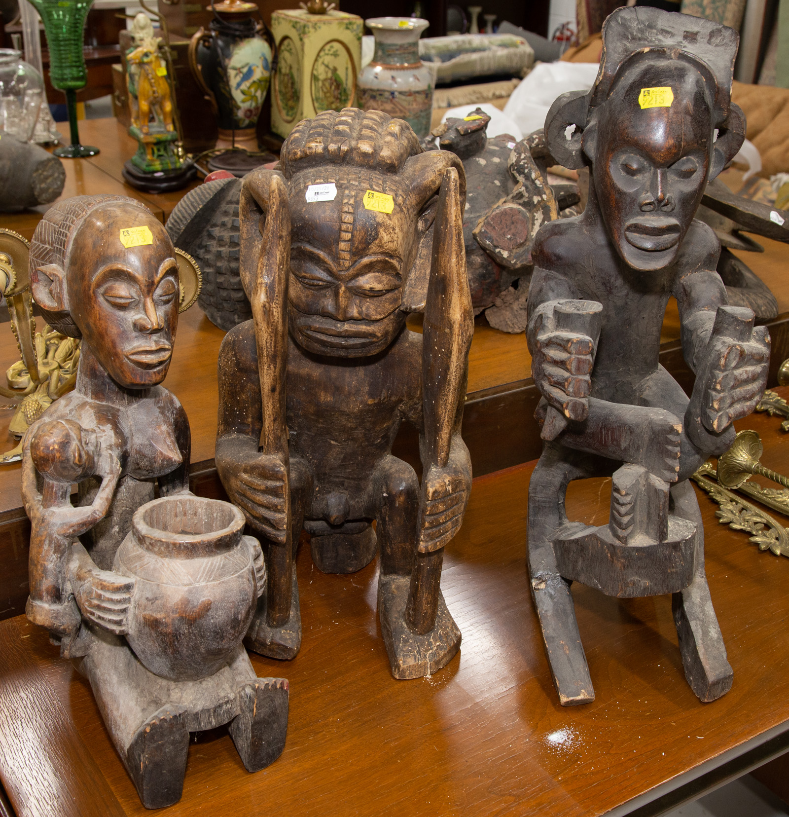 THREE AFRICAN CARVED FIGURES All 2881ed