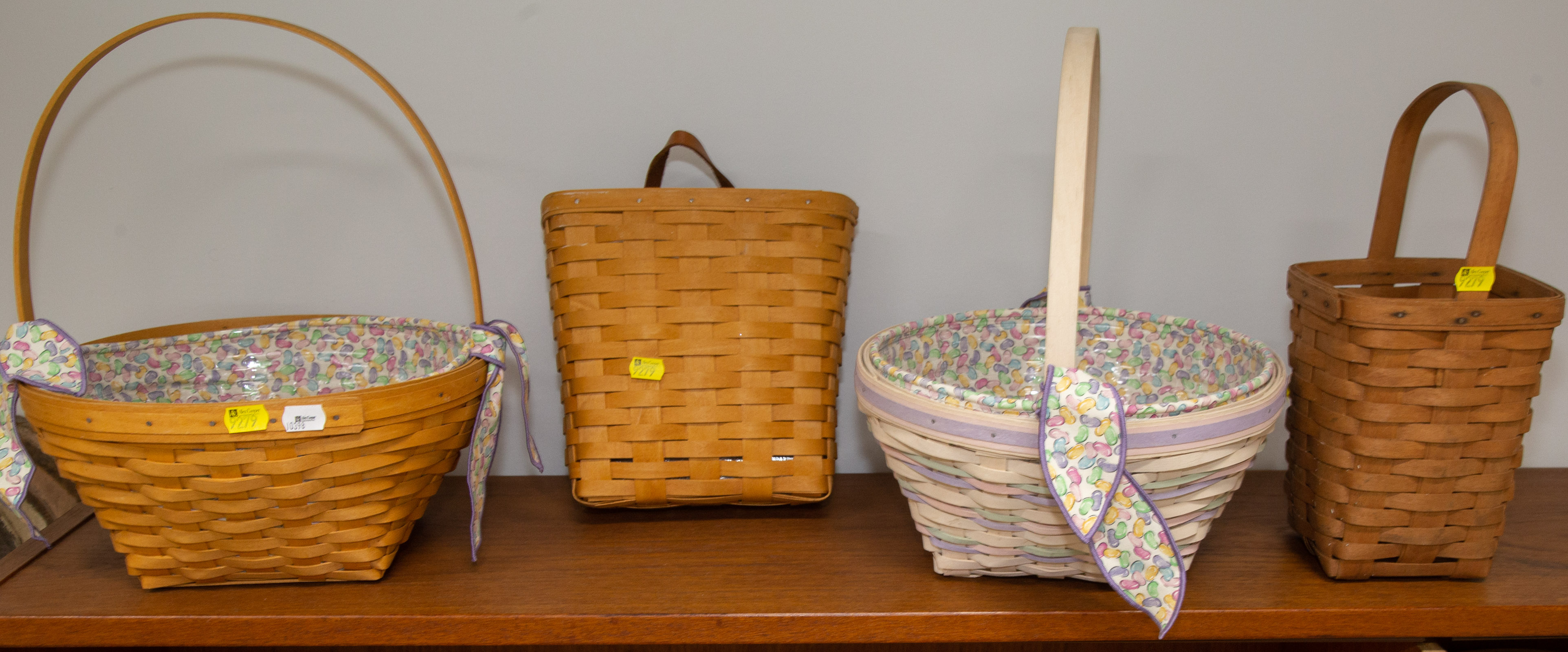 FOUR LONGABERGER BASKETS .