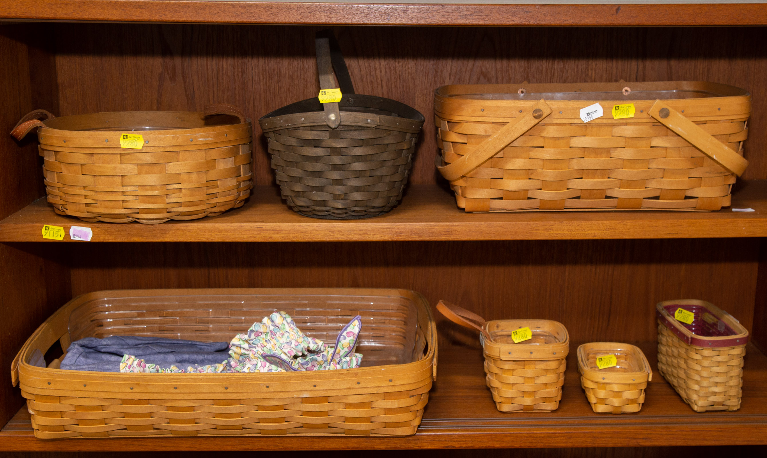 SEVEN LONGABERGER BASKETS .