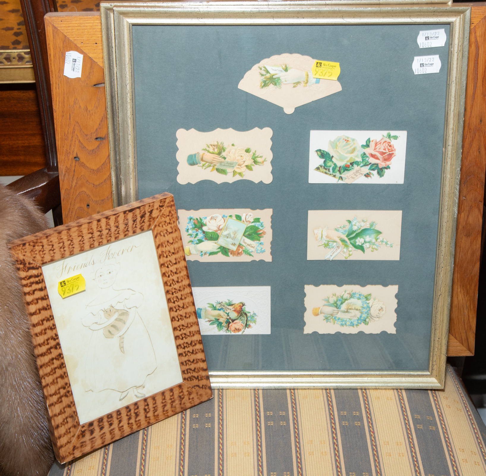FOUR FRAMED DECORATIVE ITEMS Includes