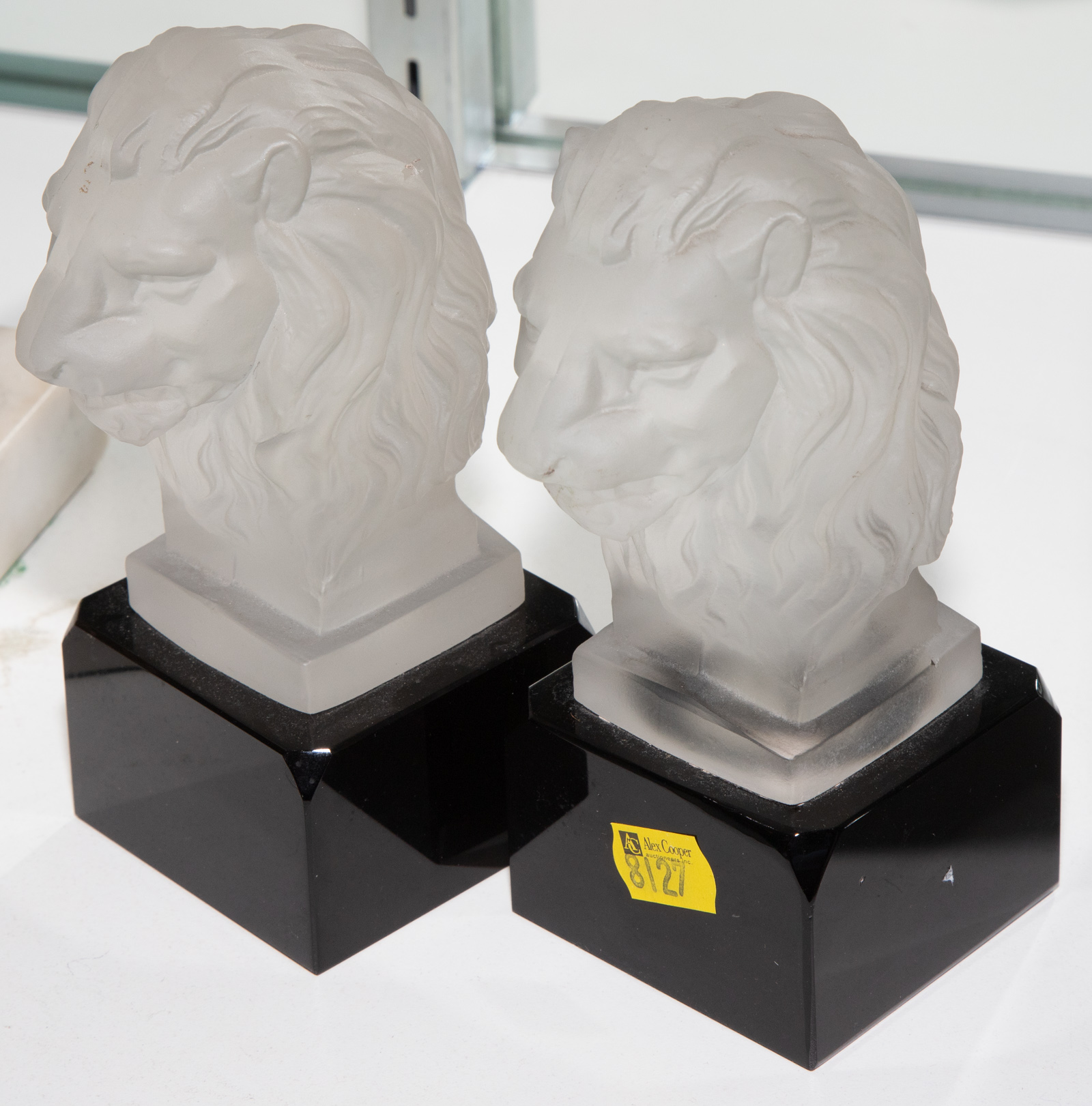 TWO GLASS LION BUSTS 2nd quarter,