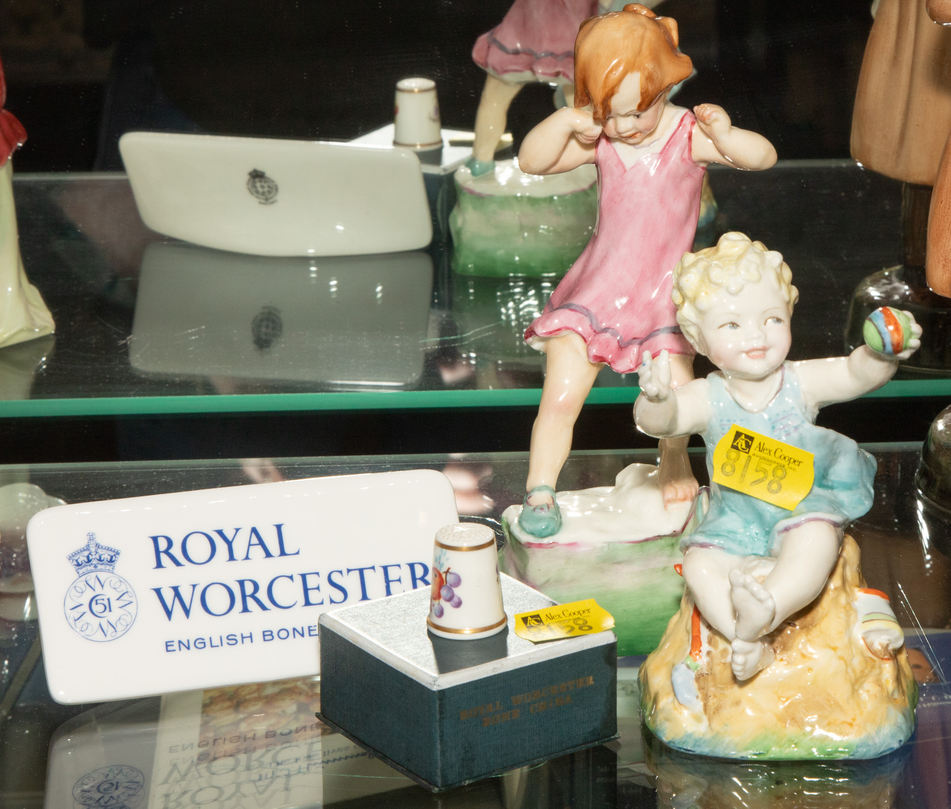 TWO ROYAL WORCESTER FIGURINES With a