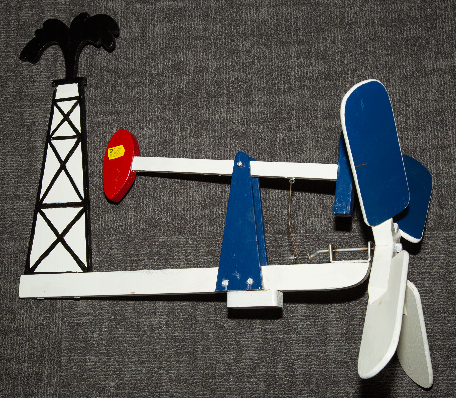 A PAINTED WOOD "OIL WELL" WHIRLIGIG