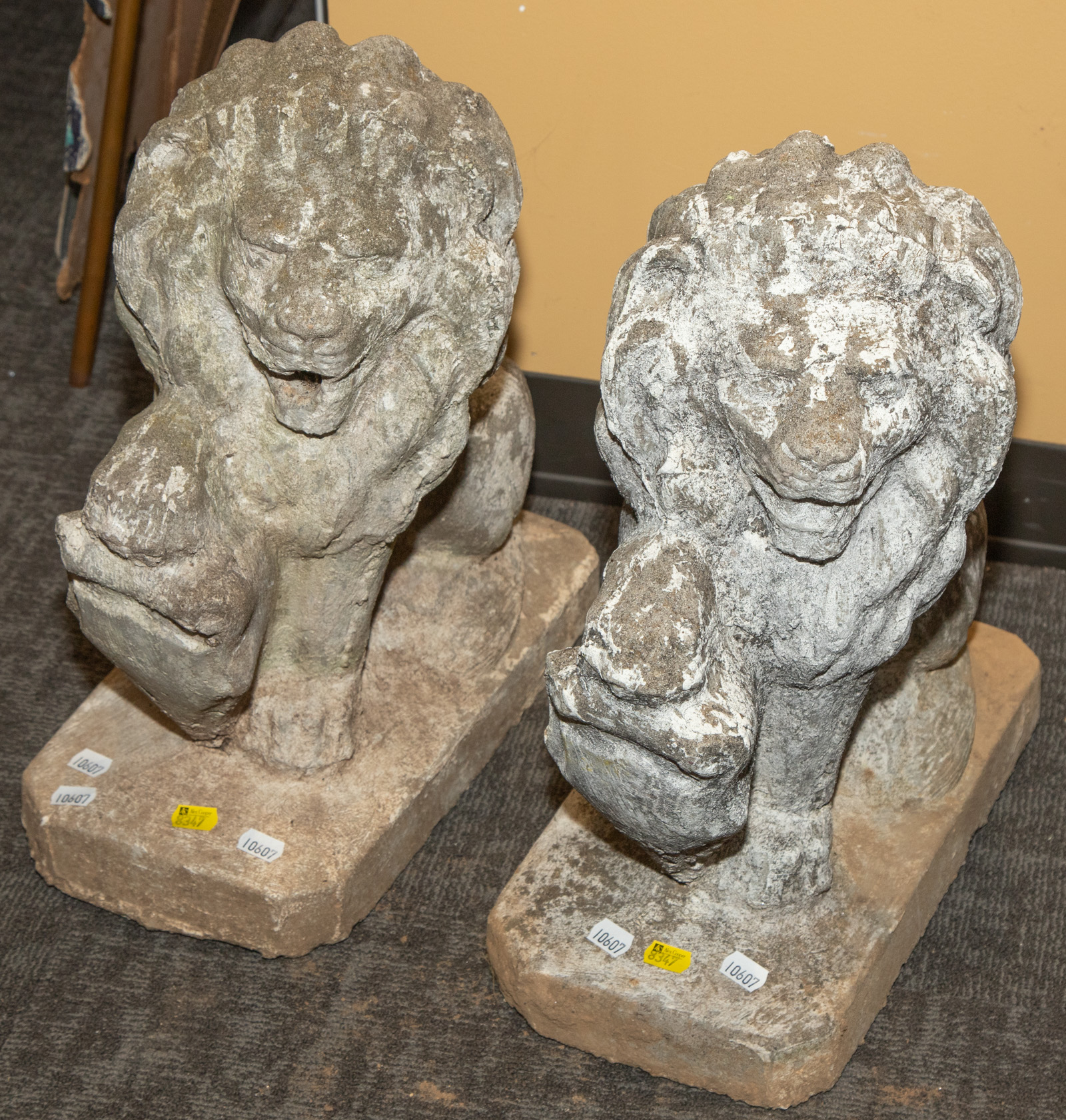 A PAIR OF CONCRETE GARDEN LIONS