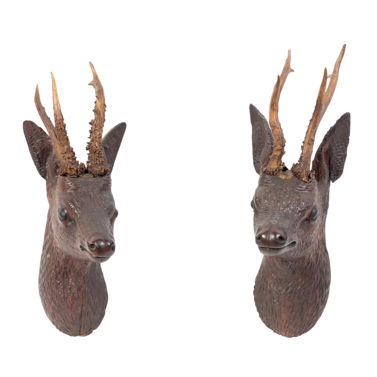 TWO BLACK FOREST WOODEN DEER'S