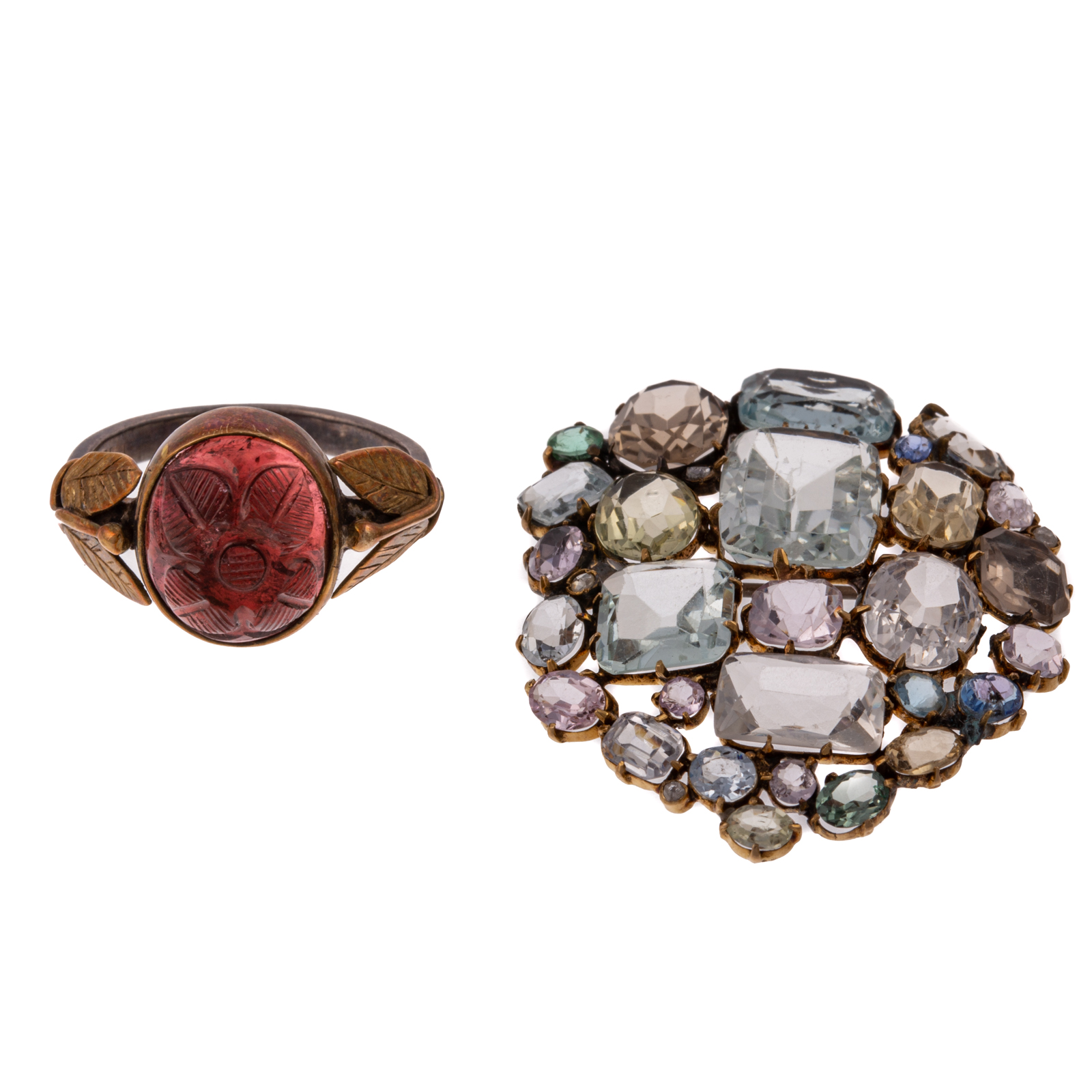 A MULTI-GEMSTONE PIN & CARVED GARNET