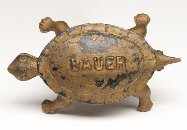 AN IRON TURTLE ADVERTISING MATCH SAFE