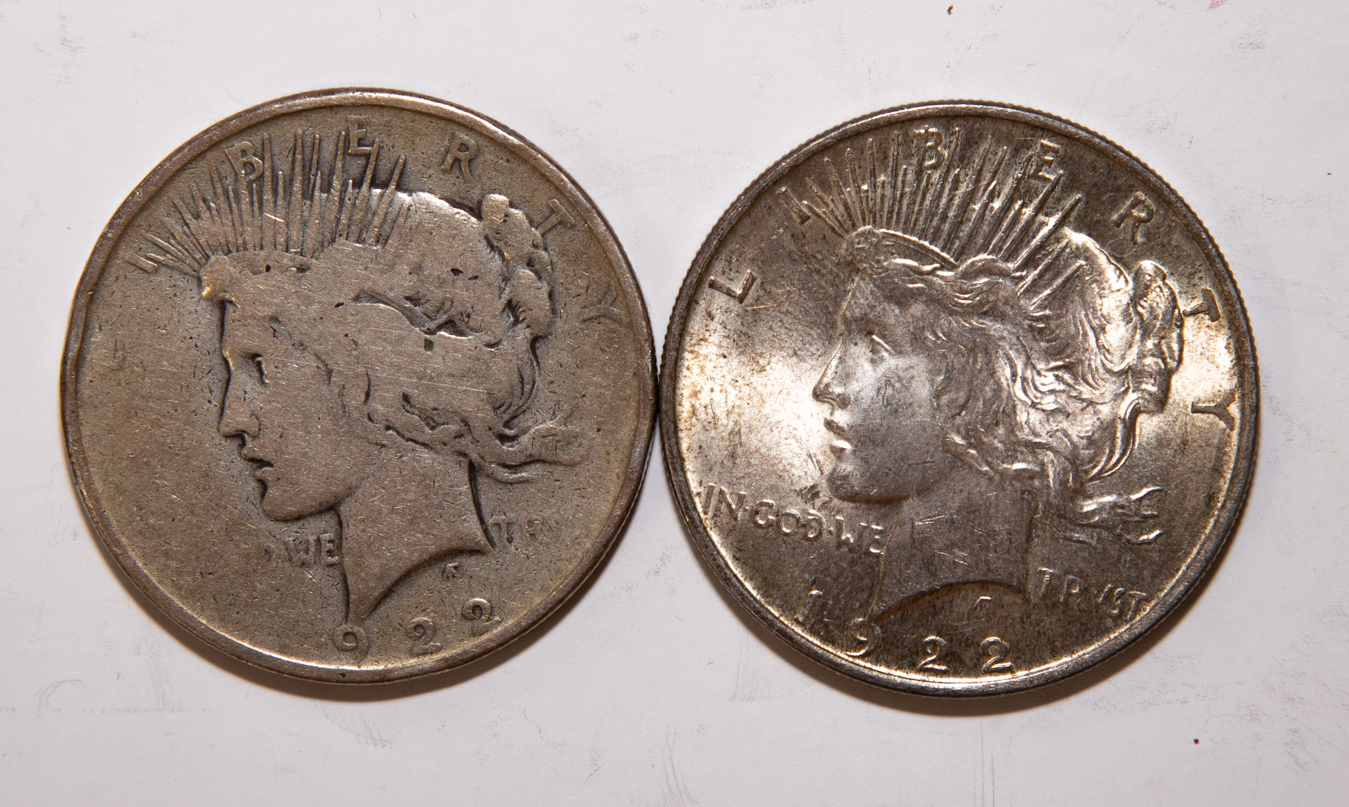 A PAIR OF 1922 PEACE DOLLARS Toned