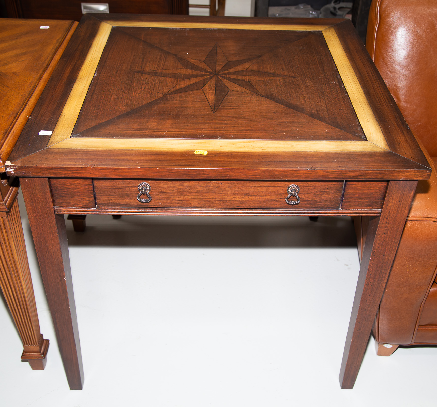 A TWO-DRAWER CENTER TABLE With composite