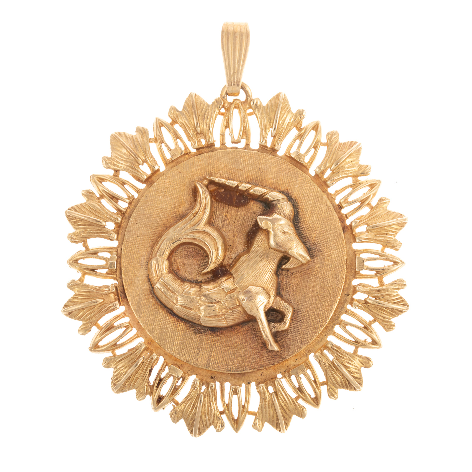 A LARGE ZODIAC SIGN PENDANT IN