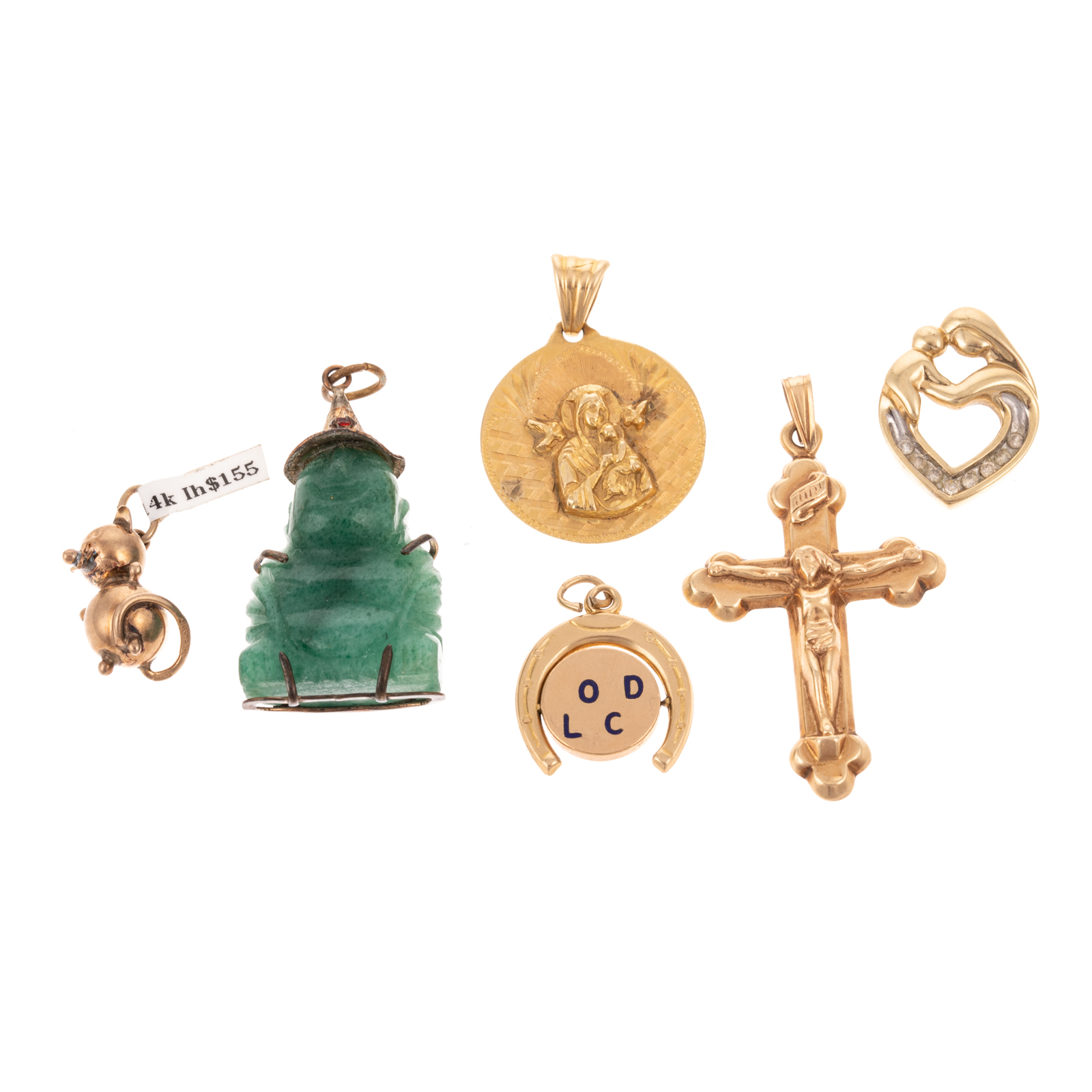 AN ASSORTMENT OF CHARMS IN GOLD Including