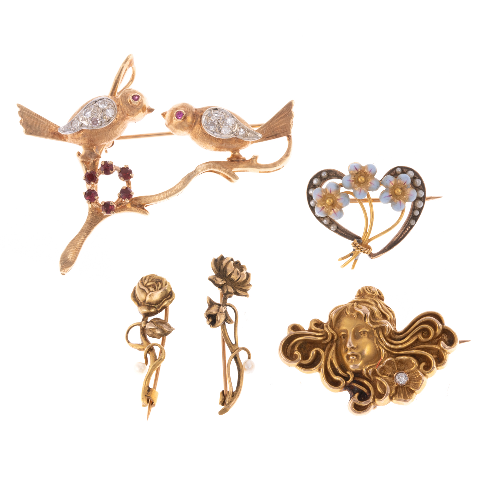 A COLLECTION OF VINTAGE BROOCHES