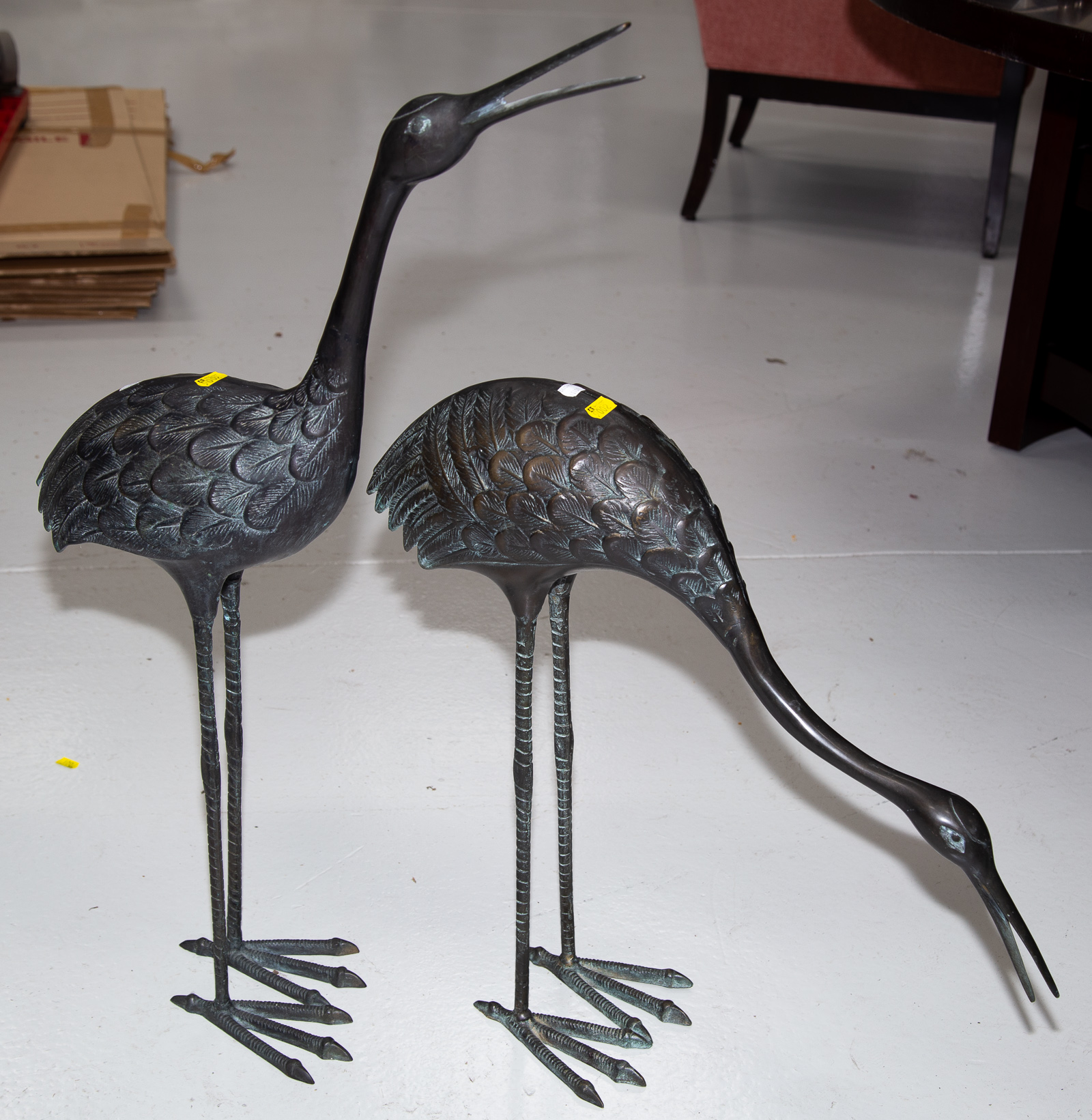 A PAIR OF PATINATED BRONZE HERON