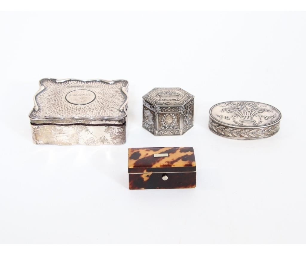 Silver boxes including an oval