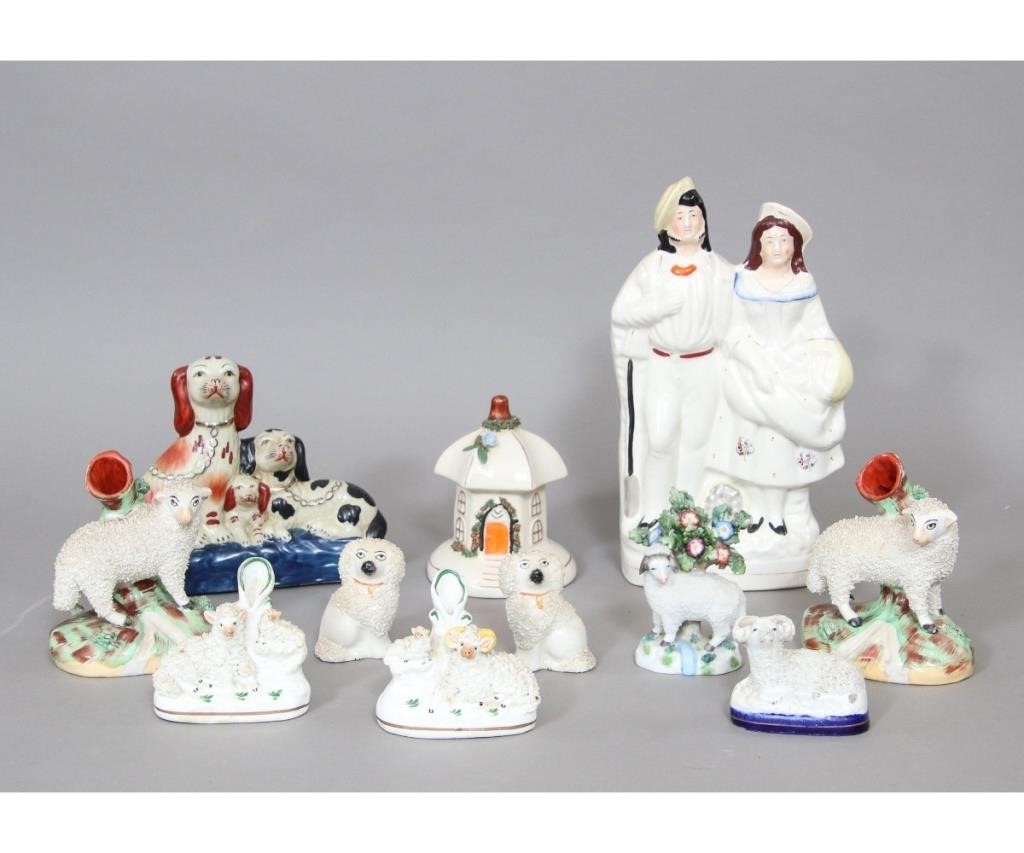 Staffordshire figures and spill vases,