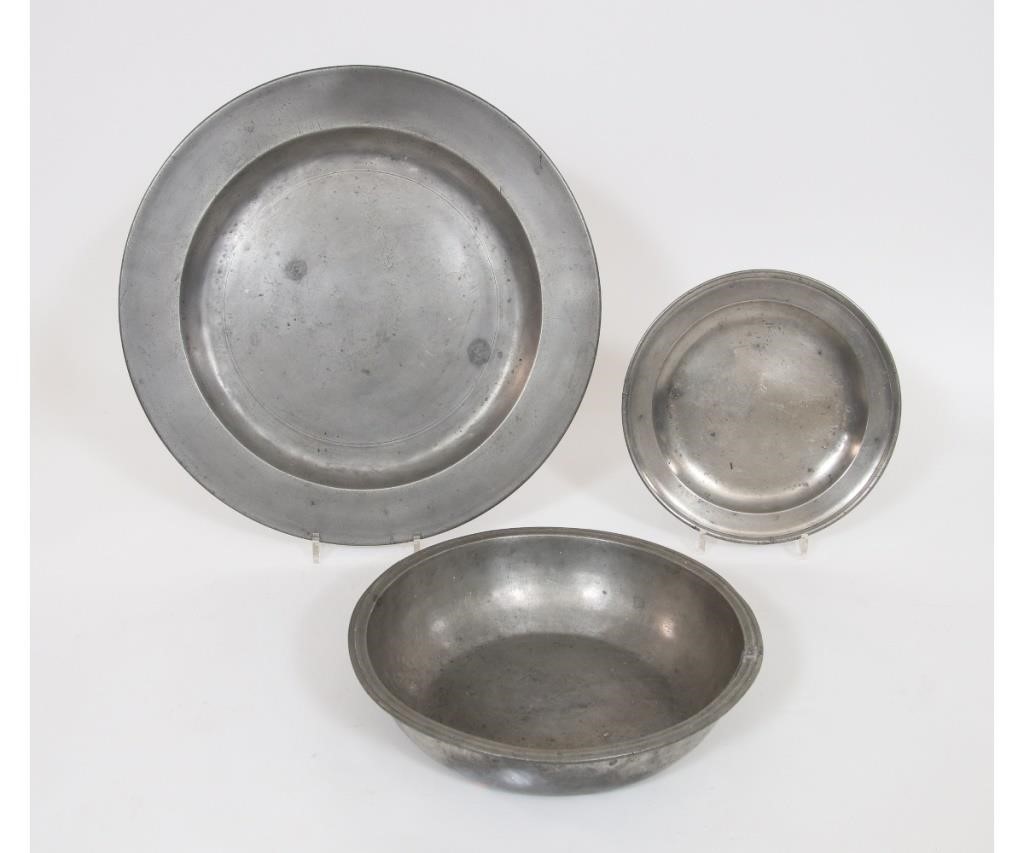 Massive pewter charger with faint