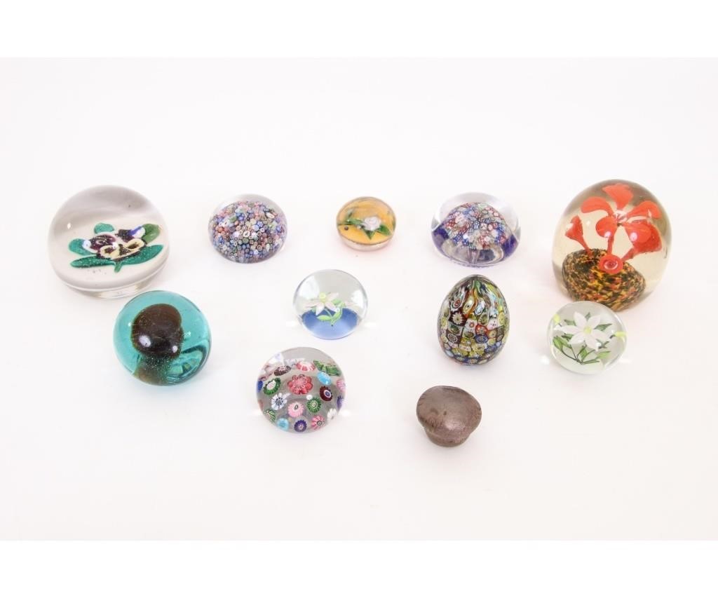 Eleven vintage paper weights including