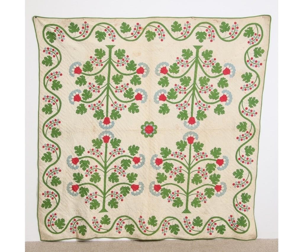 Applique quilt with potted flowers