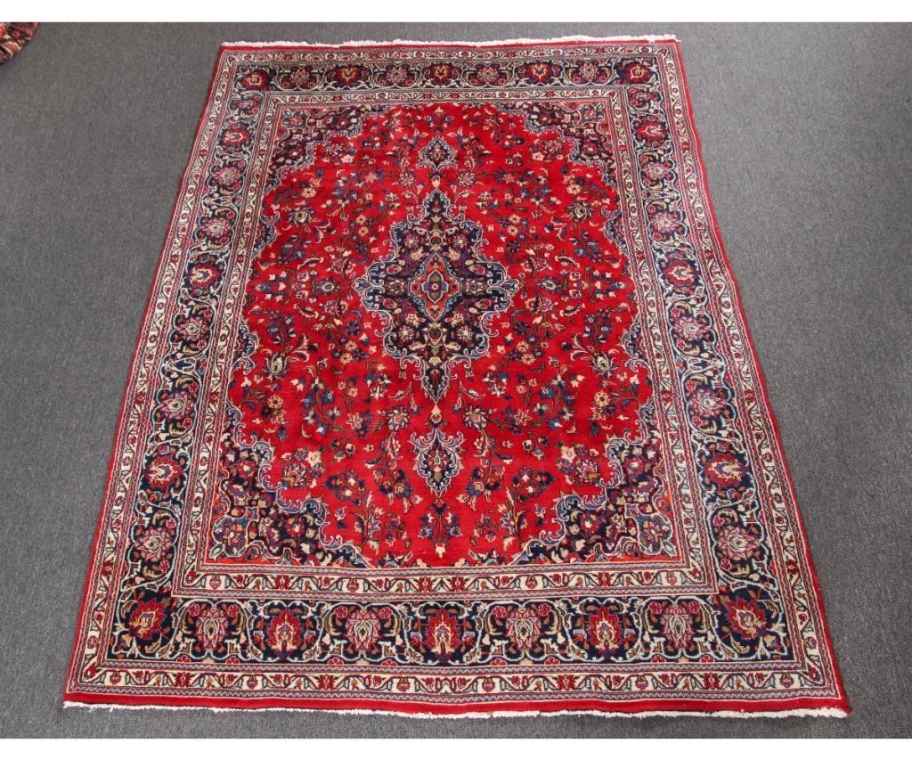 Kashan room size carpet with red