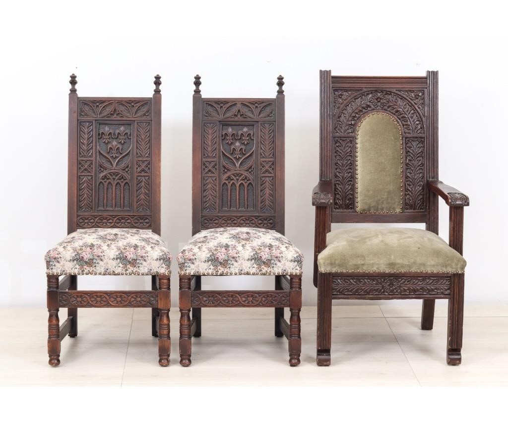 Oak Jacobean style open armchair;