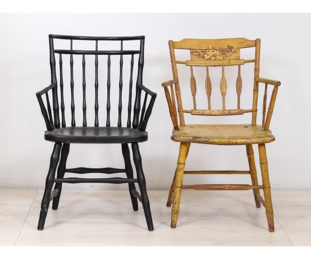 A yellow Windsor armchair stamped