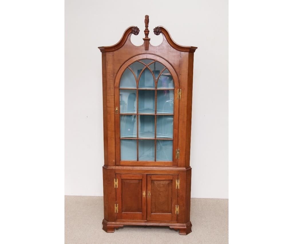 Tiger maple two-part corner cupboard,