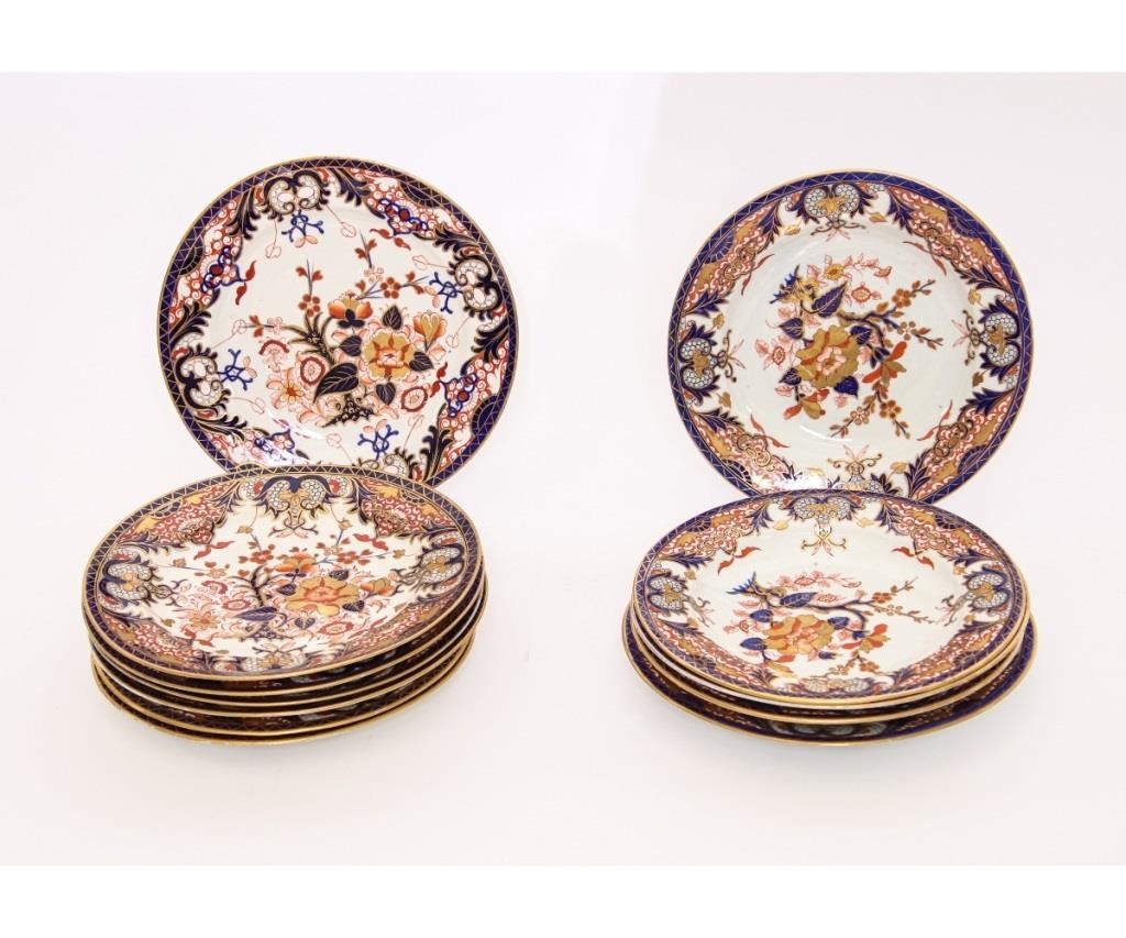 Twelve Royal Crown Derby plates and