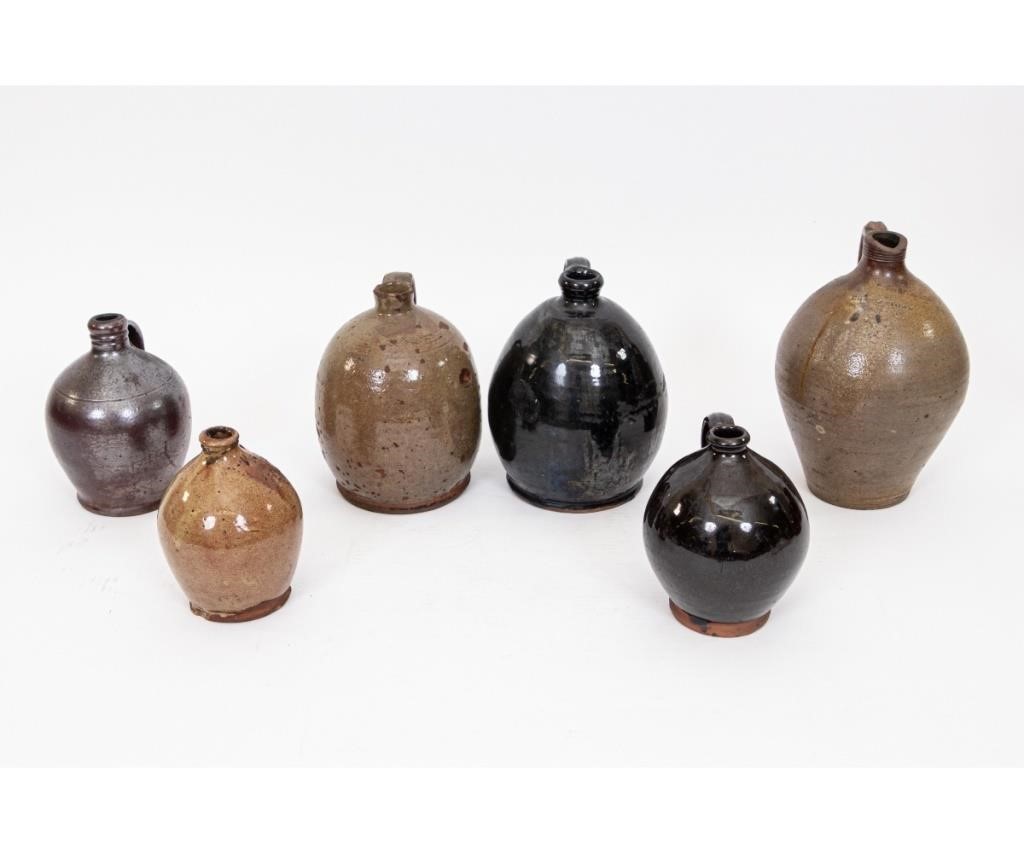 Six stoneware/redware ovoid jugs,