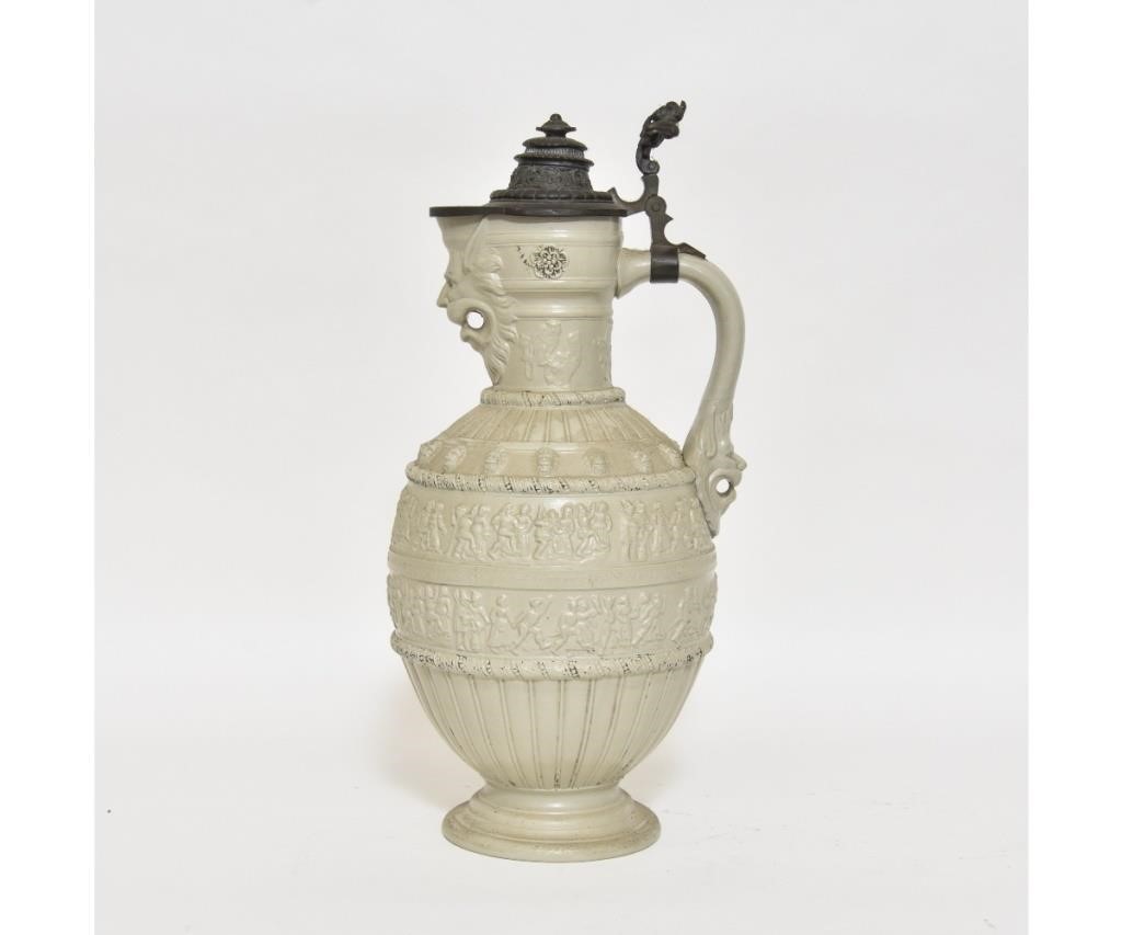 Large German pitcher with grotesque