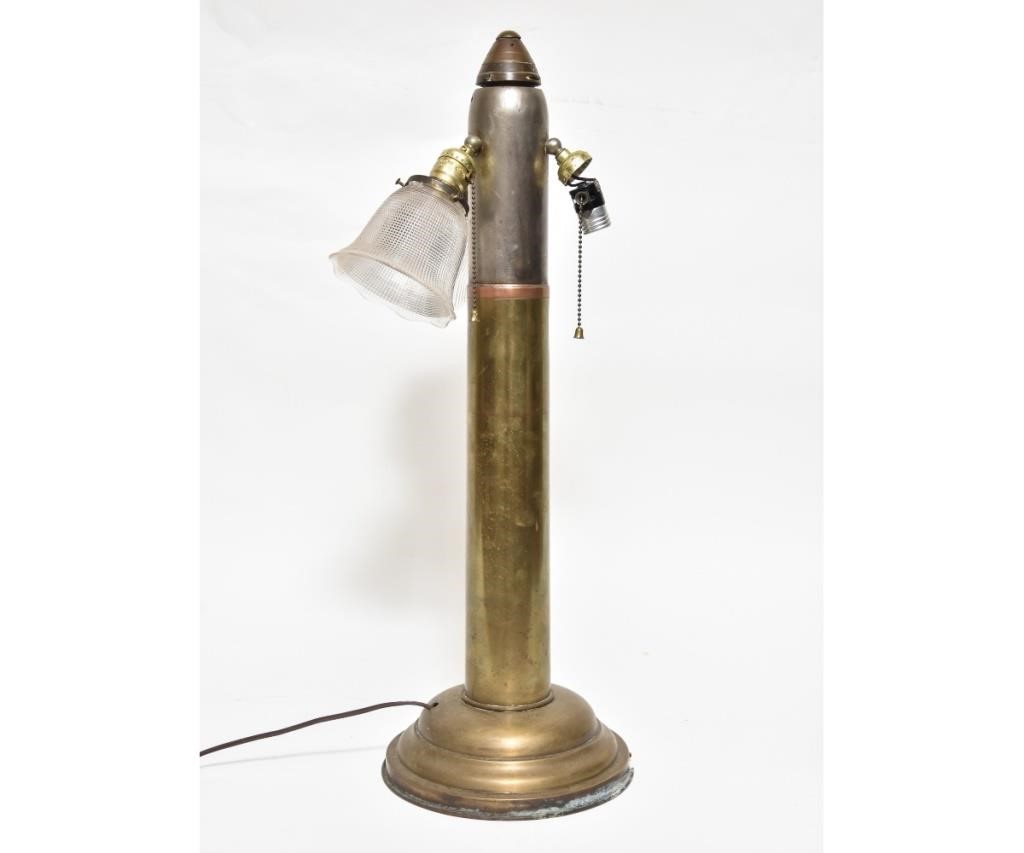 Large brass artillery shell converted