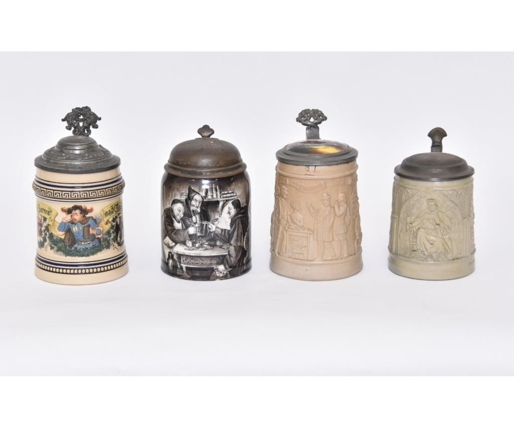 Four German steins two have relief 28acb3